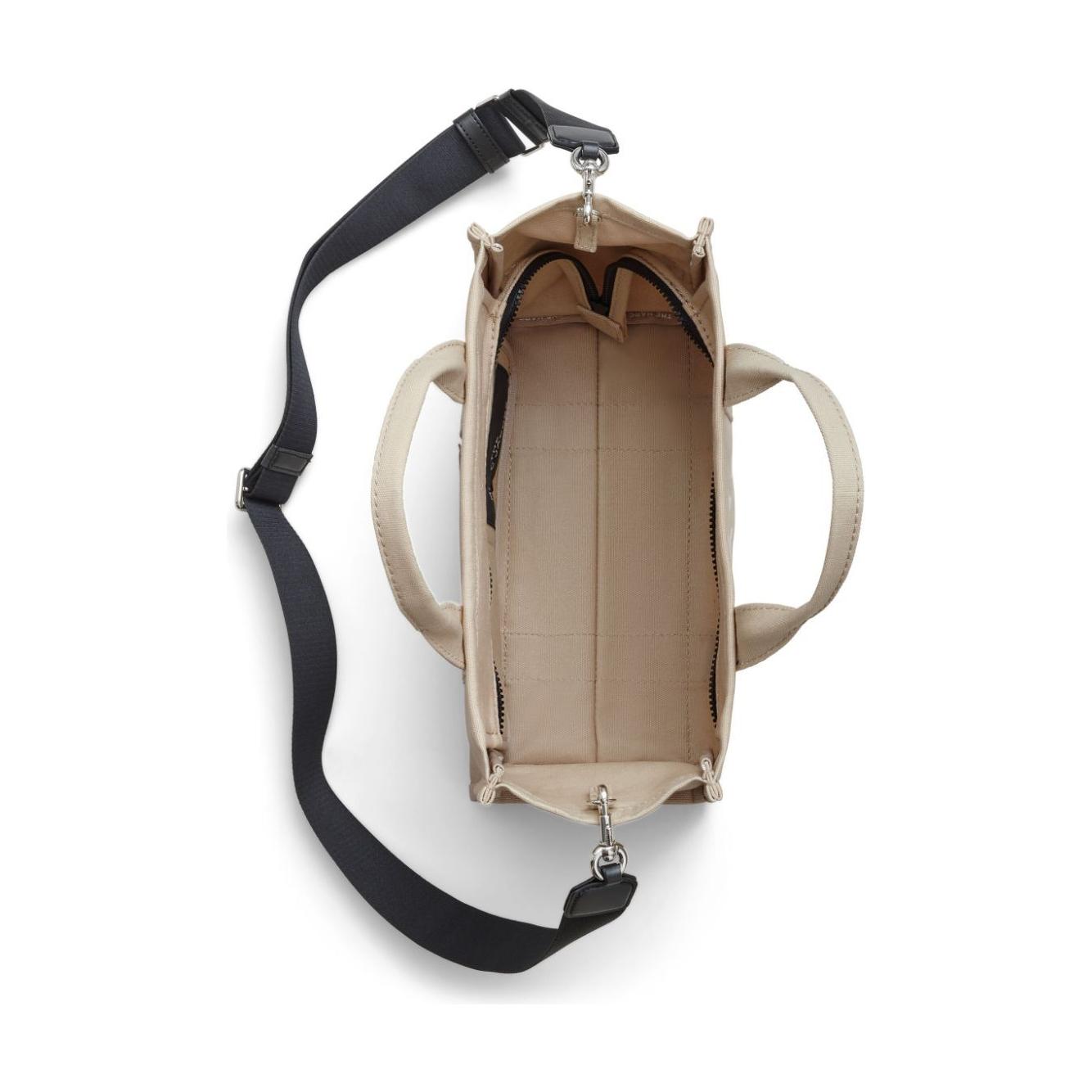 Front view with bag zipped and handles upright.