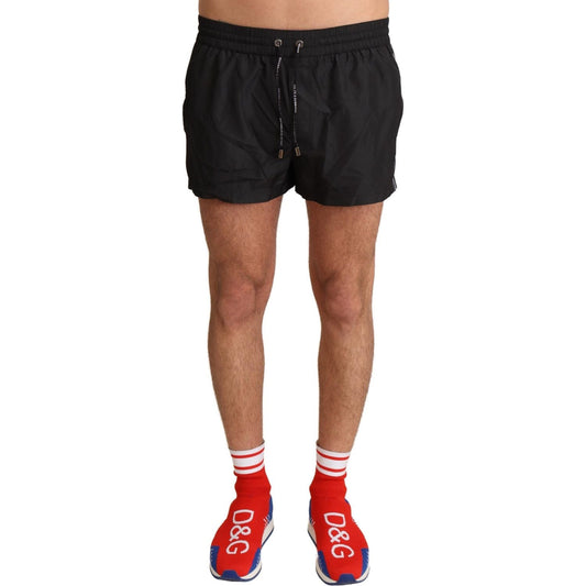 Dolce & Gabbana Elegant Black KING Motive Swim Trunks Dolce & Gabbana