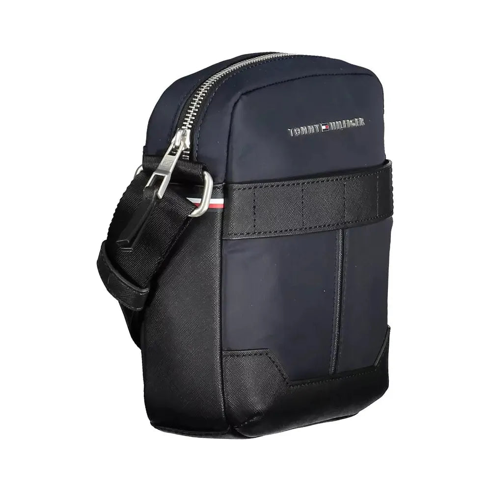 Front view with bag zipped and handles upright.