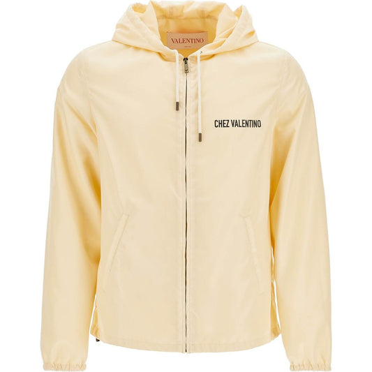 Valentino Garavani beige hooded windbreaker in logoed polyamide Jackets Valentino Garavani