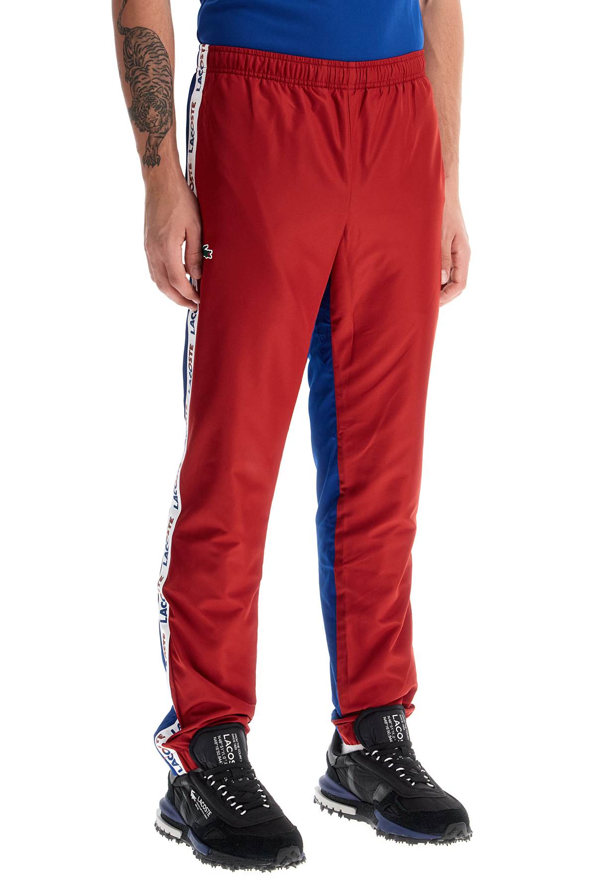 Lacoste with logo and color block design Trousers Lacoste